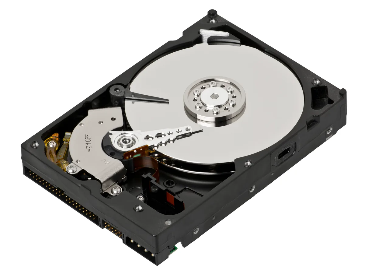 Open desktop hard drive showing the internal platter and read head
